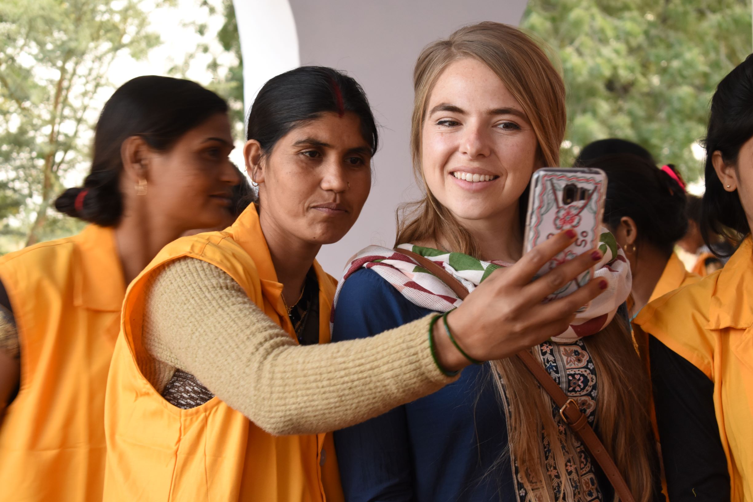 Molly working with community members in the field